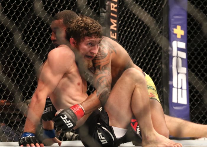 Said Nurmagomedov (r.) battles Cody Stamann at UFC 270. 